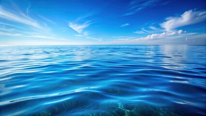 Close-up serene blue water with gentle ripples and reflections