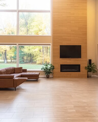 Fototapeta premium Cozy living room with large windows overlooking autumn forest in a modern home