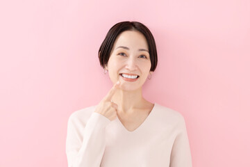 女性・歯