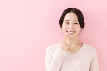女性・歯