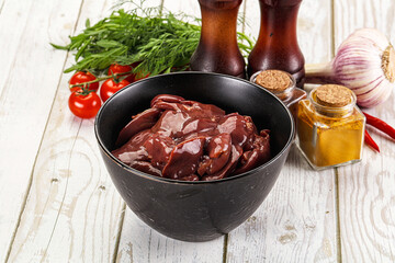 Raw chicken liver uncooked in the bowl