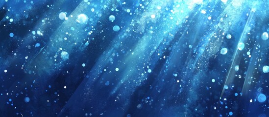 Fototapeta premium Abstract blue background with light rays and bokeh.