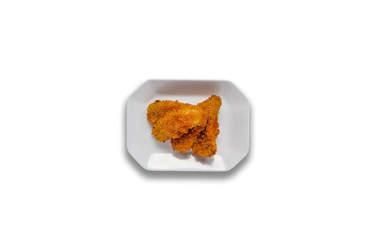 Pisang goreng or Fried bananas served on white plate. Isolayed white background. Hot Fried bananas.