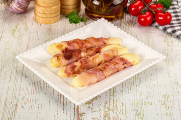 Hot mozzarella sticks with bacon