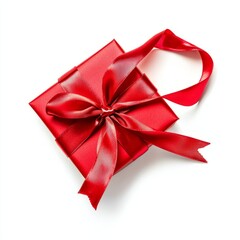 A shiny red silk ribbon wrapped around a small gift box, on isolated white background