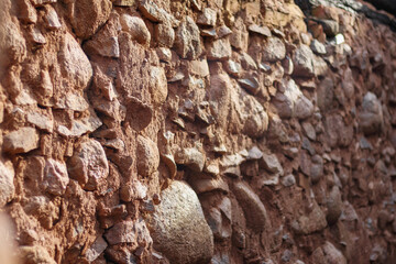 
you can see an old stone wall covered with lichen.