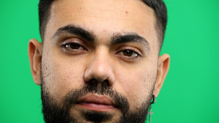 Obraz premium Man's face, close-up, on a green background