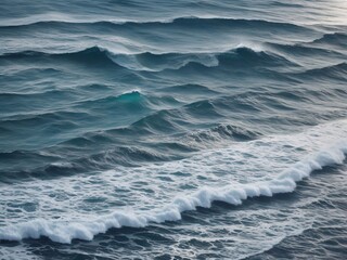 Realistic sea waves on the sand shore. Seascape in the morning or on a cloudy day.