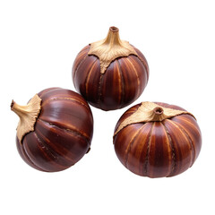 Close-up image of three shiny brown chestnuts against a cut out background.