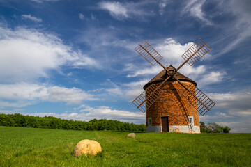 Chvalkovice windmill surrounded by rolling farmland. Moravia, Czech Republic.