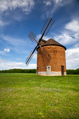 Chvalkovice windmill surrounded by rolling farmland. Moravia, Czech Republic.
