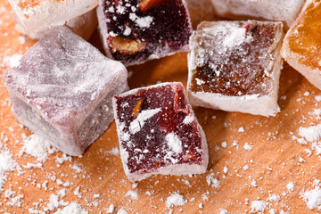 Sweet food Turkish delight, assorted rahat locum in form of cubes with nuts and powdered sugar, traditional food