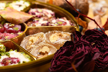 Sweet food Turkish delight on wooden background, assorted locum and candy for decorated backdrop