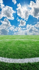 Obraz premium Soccer field with vibrant blue sky and clouds. Possible stock photo use