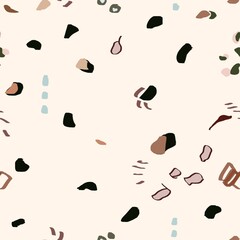 abstract scatter seamless pattern in earthy tones of beige and terracotta ideal for fabric, stationery, or home decor