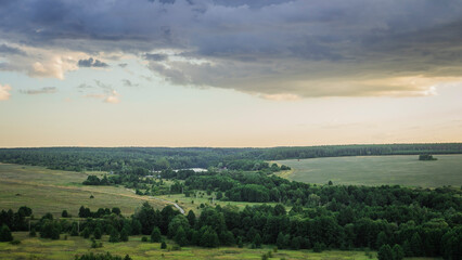 Fototapeta premium cloudy landscape at sunset in the countryside