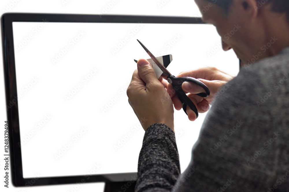 Poster closeup of man cutting credit card using scissors to end credit account. close-up of man using compu