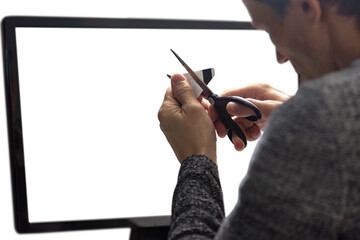 Closeup of man cutting credit card using scissors to end credit account. Close-up of man using...