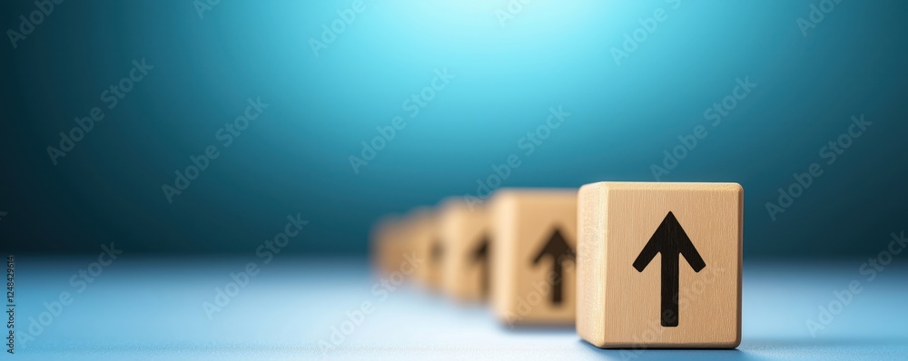 Poster a row of wooden blocks with upward arrows reflects growth and progress against a soft blue backgroun