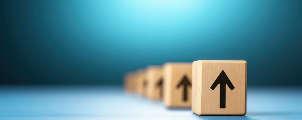 A row of wooden blocks with upward arrows reflects growth and progress against a soft blue background.