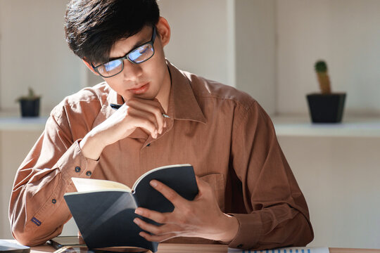 Office environment for businessmen reading and professional growth in a calm space