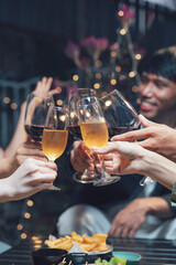 Cheers to Friendship:  Friends raise their wine glasses in a celebratory toast, their faces filled with joy and camaraderie during a festive gathering.