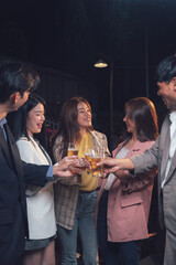 Nightlife Cheers: Friends raise their glasses in a toast, celebrating together in a dimly lit bar or club, their laughter and camaraderie filling the air.  