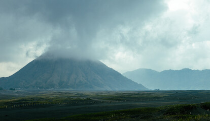 Fototapeta premium January winter, Bromo Volcano morning scenery seen from mountain foot, Indonesia