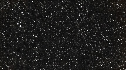 A transparent black distressed overlay background with tiny white particles scattered across it- creating an impression of stars or snowflakes in the night sky.