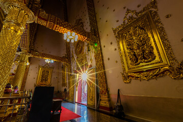 The interior of the large pagoda Wat Phra That Nong Bua has a Buddha statue and a long history,...