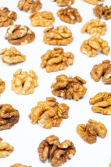 Shelled walnuts on a white background close-up
