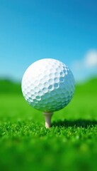 Immaculate golf ball on vibrant green, clear blue sky , idyllic, serenity