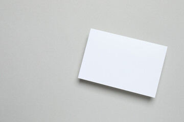White card on gray background