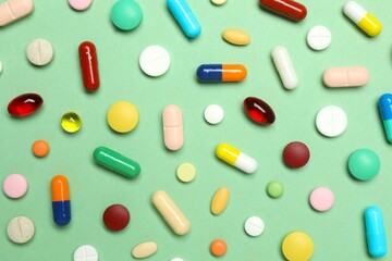 Various pills on gray background