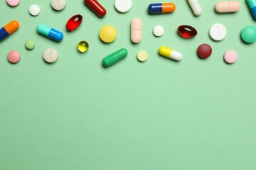 Various pills on gray background
