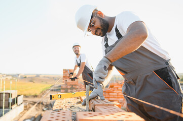 Group of indian workers at a construction site
