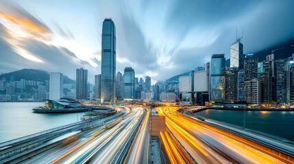 Obraz premium Breathtaking Cityscape: A Panoramic View of Hong Kong's Skyline at Dusk, Showcasing its Modern Architecture and Vibrant Urban Life