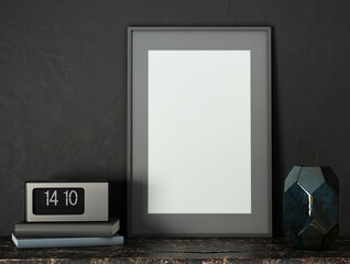 Black mock up poster frame on dark plaster wall with table radio, books and glass vase on vintage wooden table; portrait orientation; stylish frame mock up; 3d rendering, 3d illustration