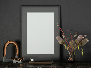 Black mock up poster frame on dark plaster wall with flowers in a glass vase, books and props on vintage wooden table; portrait orientation; stylish frame mock up; 3d rendering, 3d illustration