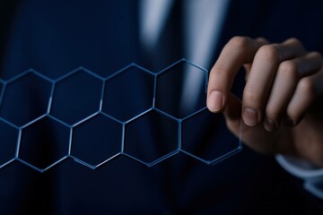 Modern businessman holding a hexagonal structure, showcasing innovation and technology in a corporate environment, symbolizing creativity and progress
