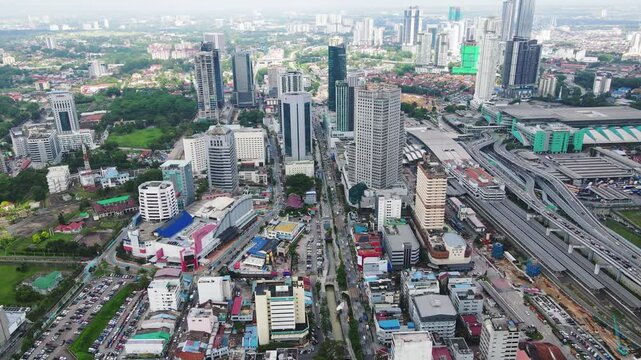 Aerial Birds Eye view dolly out shot above Johor Bahru City at day