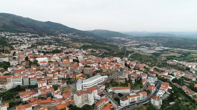 Drone capturing (from an upview) the buildings of Covilh&atilde;, Portugal.