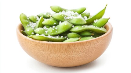 Fresh edamame in wooden bowl with sea salt