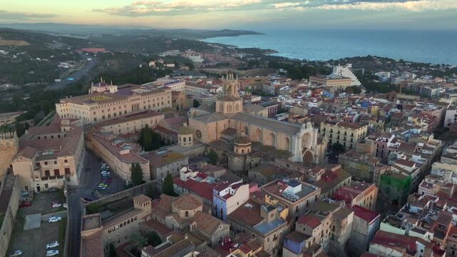 Catedral de Tarragona, Aerial view at Sunset Time with dramatic sky. Coastal City of Tarragona, Catalonia, Spain. 