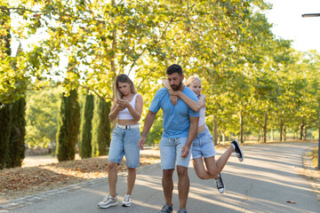 Obraz premium Family enjoying a leisurely walk in nature
