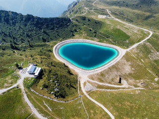 aerial view of the artificial lake and the nearby refuge at Piani di Bobbio.