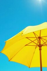 Sunny day, bright yellow parasol, vibrant blue sky, happy, relax, sonnenschirm