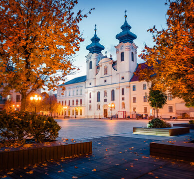 Astonishing evening view of Gyor Benedictine Church of St. Ignatius of Loyola. Beautiful autumn cityscape of Gyor town, capital of Gyor-Moson-Sopron County and Western Transdanubia region, Hungary.