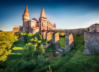 Astonishing morning view of Hunyad Castle / Corvin's Castle. Spectacular summer scene of Hunedoara,...