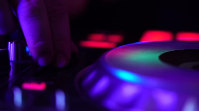 Close Up of DJ Controller and Hands, Playing Music on Party Event or Nightclub